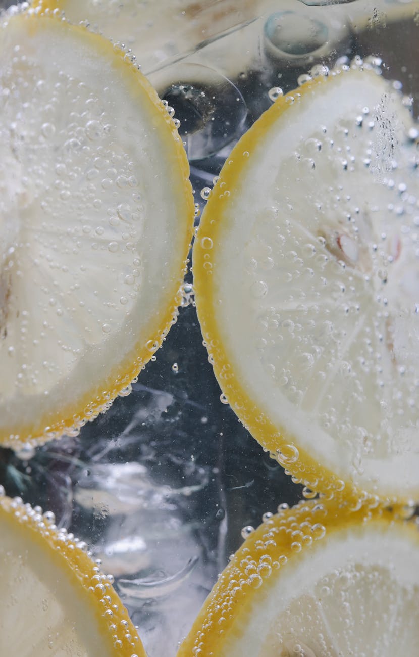 glass with water and lemon slices